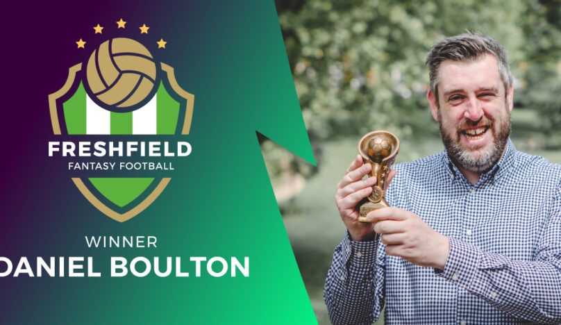 Daniel Boulton, winner of the Freshfield charity fantasy league, holding a winner's trophy