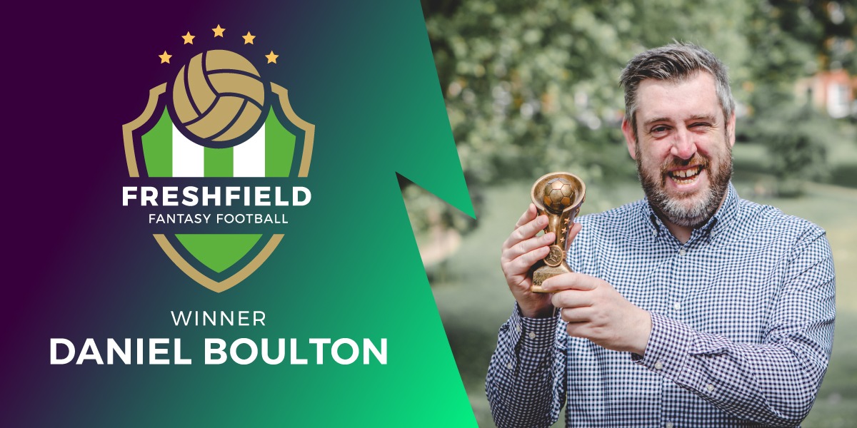 Daniel Boulton, winner of the Freshfield charity fantasy league, holding a winner's trophy